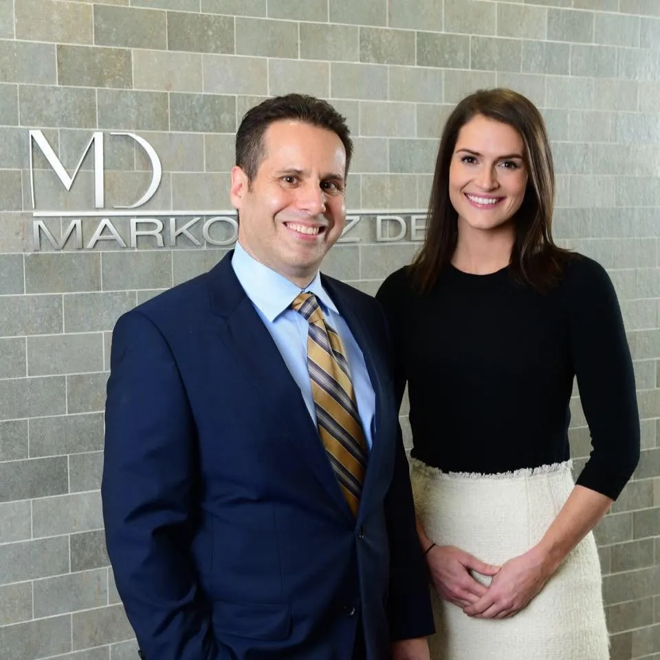 Dr. Eric S. Markowitz  and Dr. Clare A. McGorry from Markowitz Dental of Washington DC